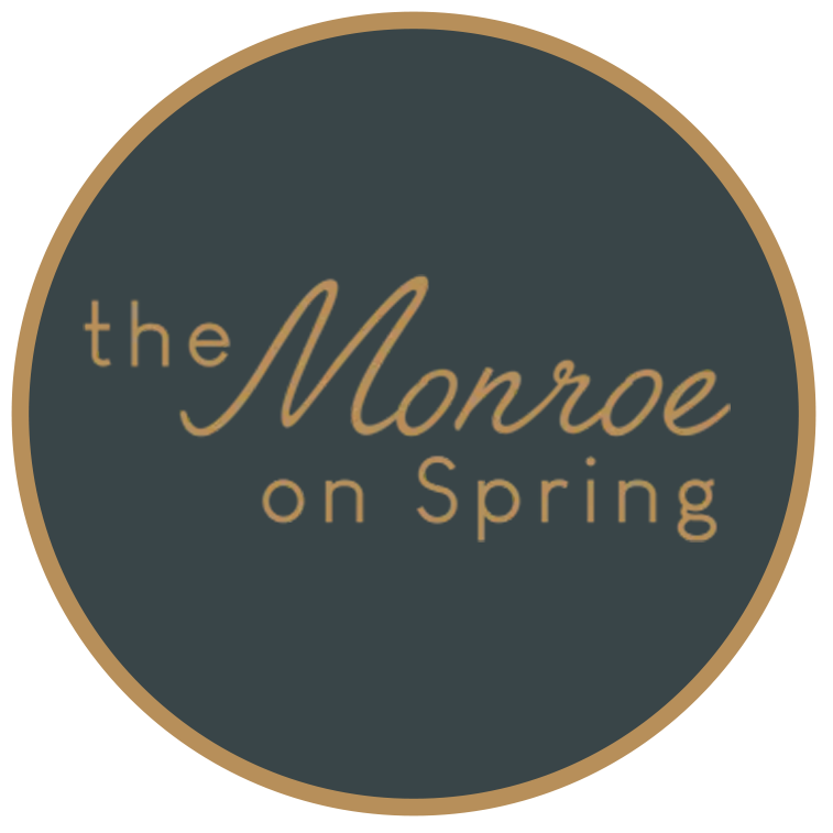 The Monroe on Spring logo.