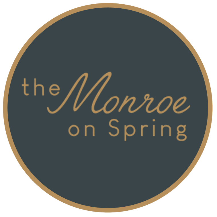 The Monroe on Spring logo.